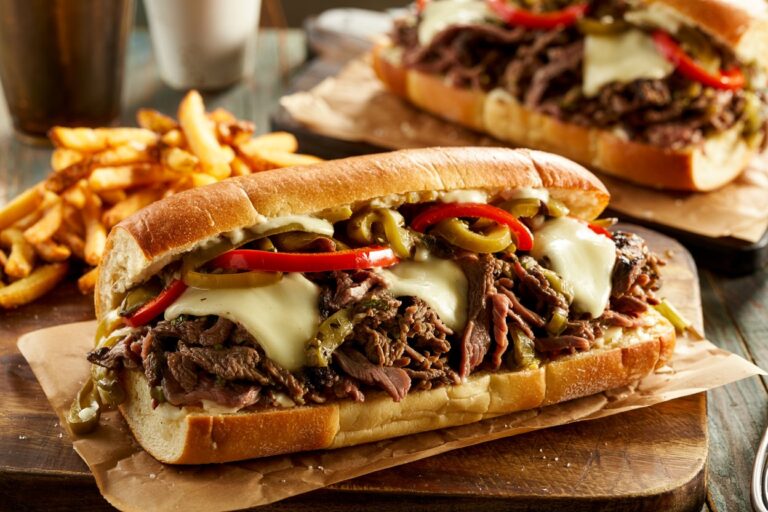Loaded Philly Cheesesteak with Garlic Butter Hoagie & Fries: The Ultimate Comfort Food Experience
